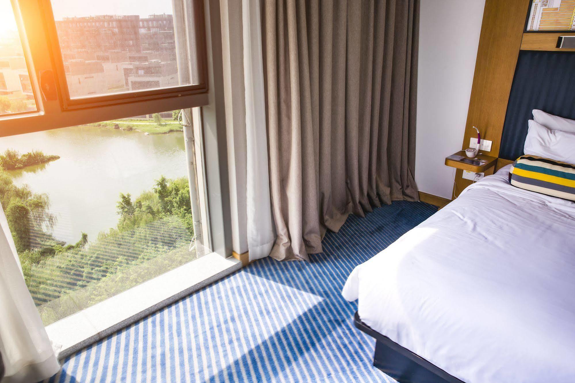 Aloft Dongguan Songshan Lake Екстер'єр фото